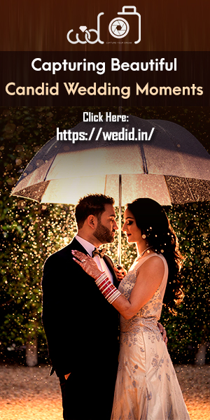 Happy Married couple having Fun Together in outdoor shot by Best candid wedding photographer.